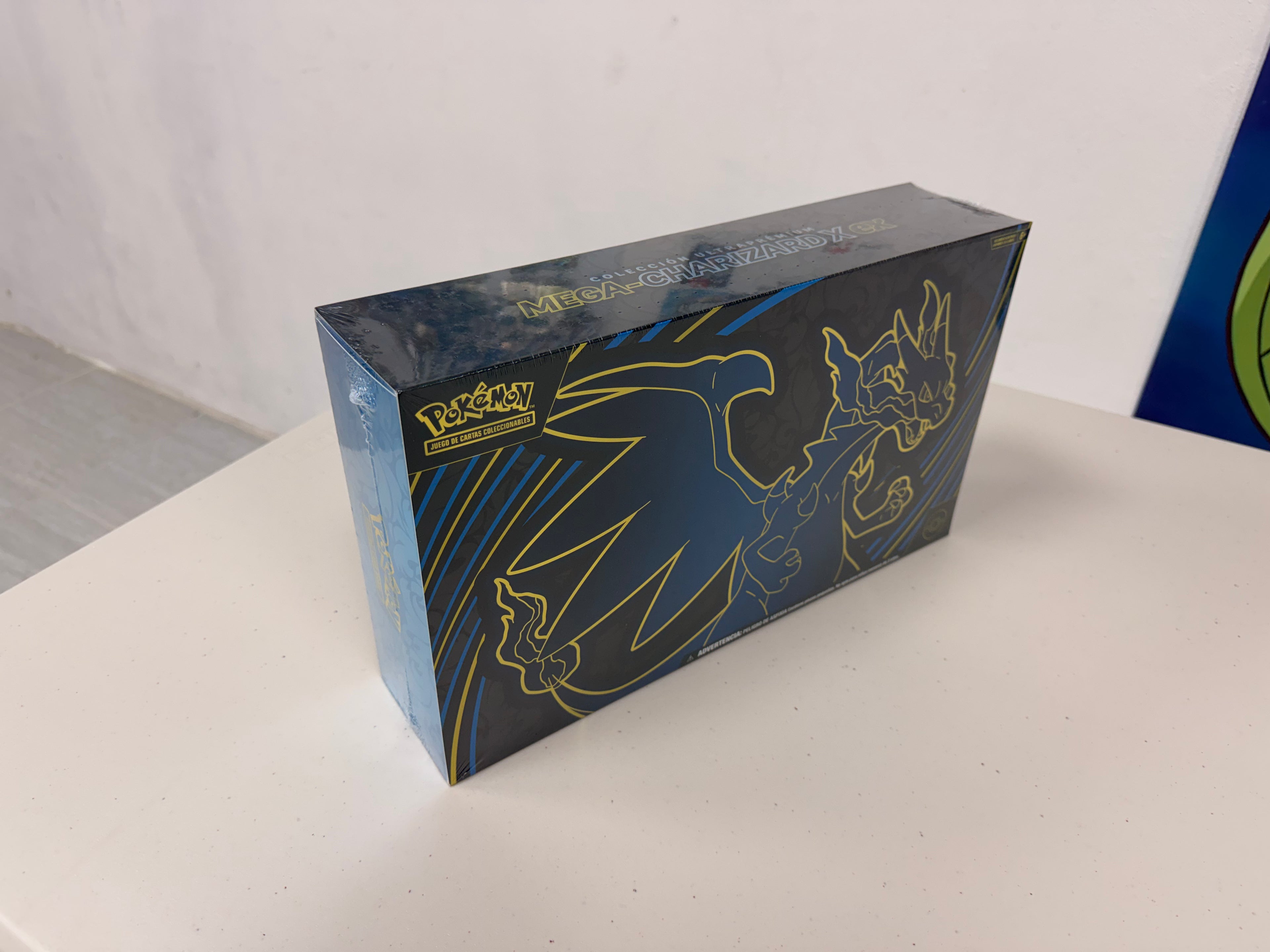 Colección Ultraprémium Mega‑Charizard X ex de JCC Pokémon